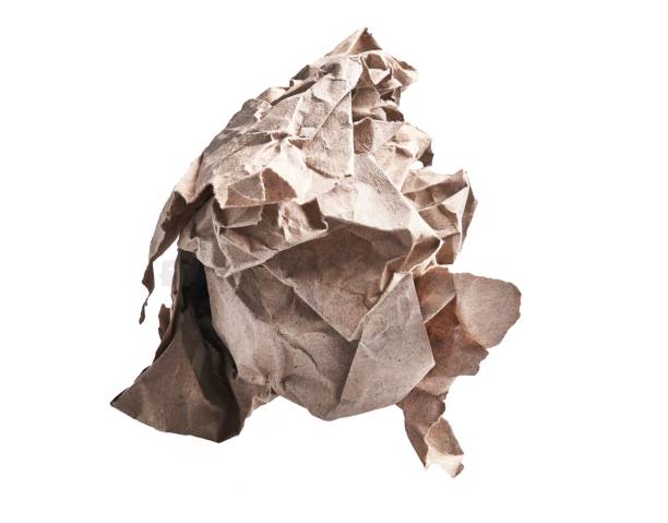 istock One brown crumpled paper ball over isolated white background 1486012849
