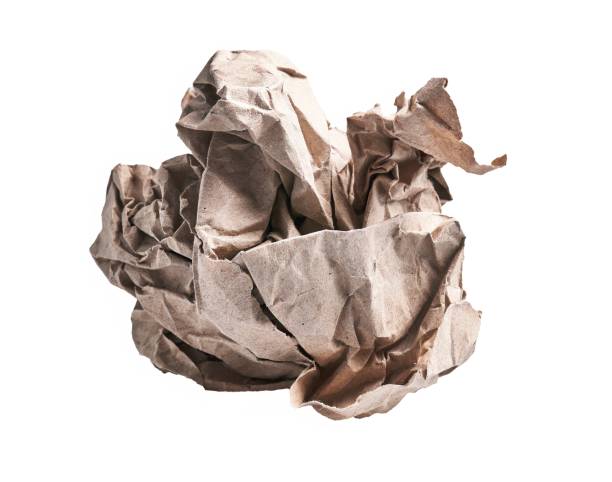 istock One brown crumpled paper ball over isolated white background 1486012906