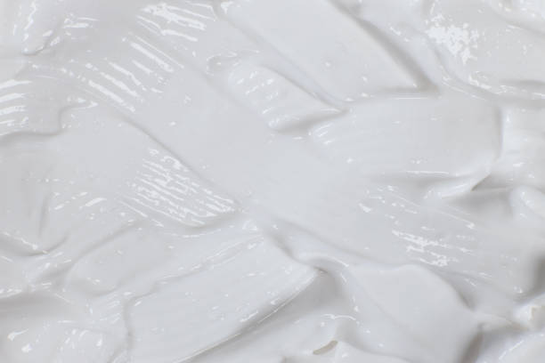istock Texture of white cream for body or face 1486014884