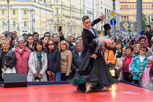 Moscow, Russia - September, 2017: Amateur dancers demonstrate their art of ballroom dancing on the central street of Moscow on City Day. Sensual tango.