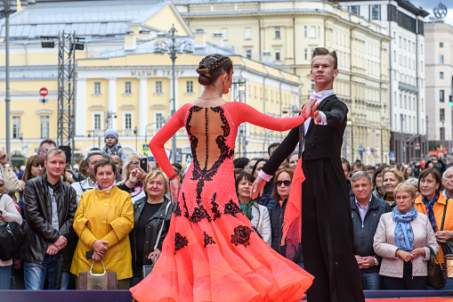 Moscow, Russia - September, 2017: Amateur dancers demonstrate their art of ballroom dancing on the central street of Moscow on City Day. Classic slow waltz.