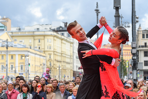 Moscow, Russia - September, 2017: Amateur dancers demonstrate their art of ballroom dancing on the central street of Moscow on City Day. Classic slow waltz.