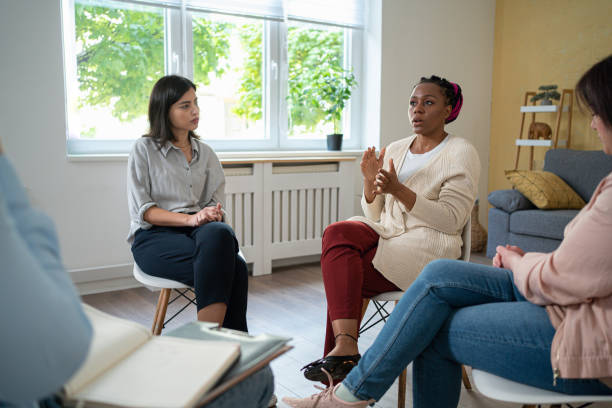 istock During multiracial group therapy, woman sharing her thoughts and emotions 1486029217