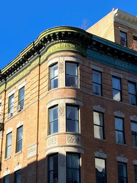 istock Corner of an old Harlem building illuminated by sunlight 1486029402
