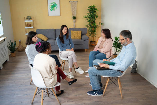 istock People sharing their thoughts and emotions during multiracial group therapy 1486029581