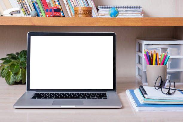 istock Laptop on desktop with blank screen in children's room. Kid education mockup, template 1486036343