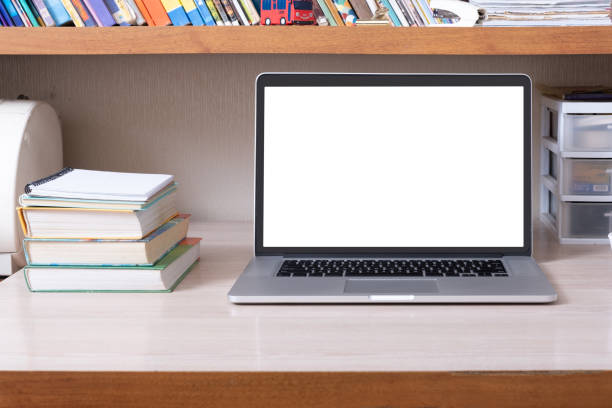 istock Laptop on desktop with blank screen in children's room. Kid education mockup, template 1486036345