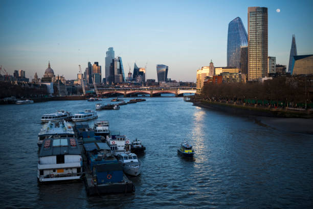 istock River Thames in London as moon rises over the capital 1486038653