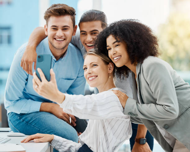 istock Selfie, teamwork and diversity with a corporate team with a mission and vision for success, growth and innovation. Portrait of happy collaboration with friends and staff for motivation in an office 1486048081