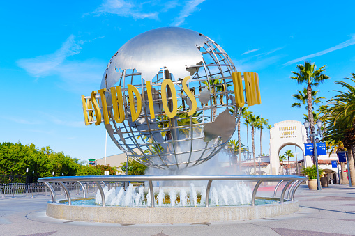 Los Angeles, California - January 18, 2023: Universal Studios Hollywood globe and entrance area on a sunny day
