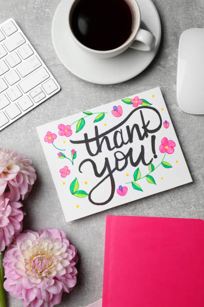 istock Card with phrase Thank You, dahlias, coffee and notebook on grey table, flat lay 1486051598