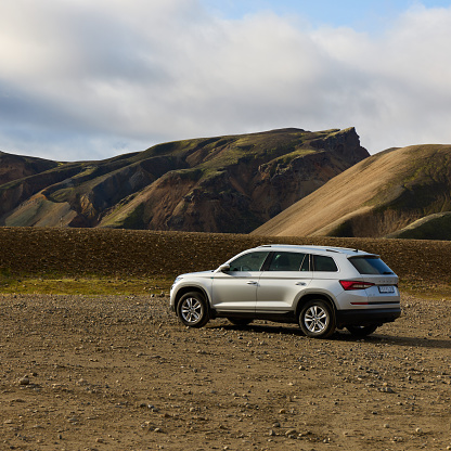 Skoda Kodiaq in a camp in the LANDMANNALAUGAR mountains in Iceland about the sunrise. Iceland, 24.08.2021