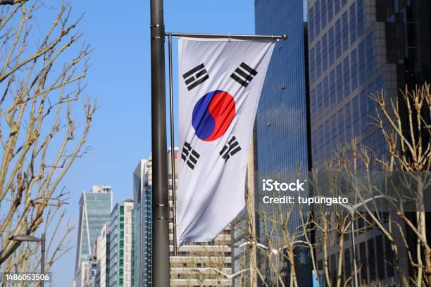South Korean Flag In Seoul Stock Photo - Download Image Now - South Korean Flag, Flag, Capital Cities
