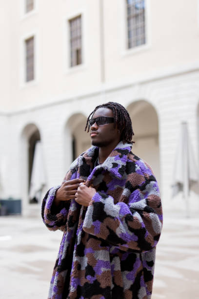 istock Young Afro man posing on the street 1486053658