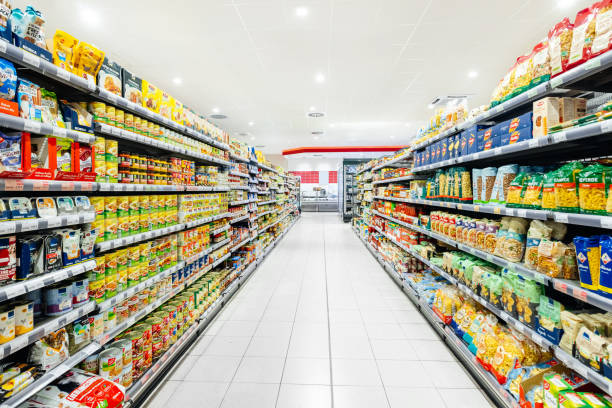 A Supermarket Aisle Filled With Food Items stock photo