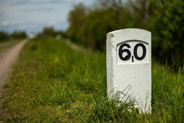 istock Milestone along a country road 1486055089