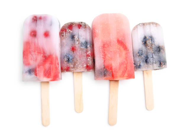 istock Tasty berry popsicles on white background, top view 1486055628