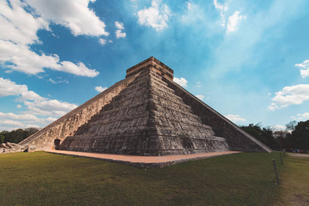 Pyramid and city in ruins in Tulum Mexico. Sunny Day in the Historic Maya City for tourism.