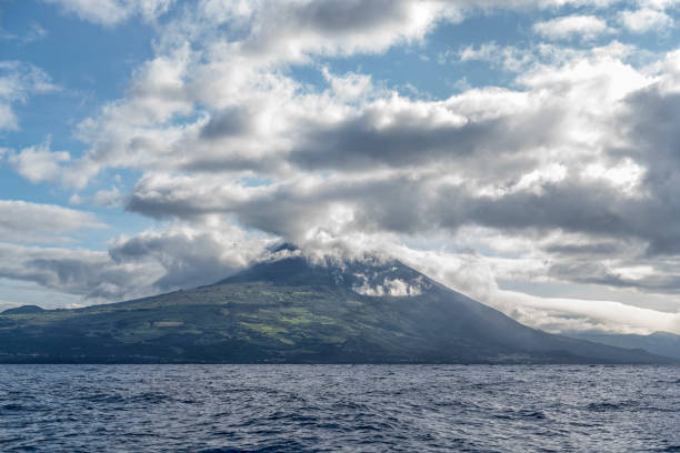 istock Pico volcano view from the sea 1486065752