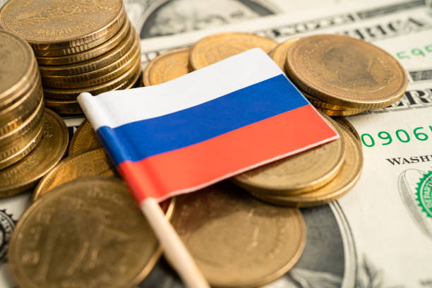 istock Stack of coins with Russia flag on white background. 1486068666