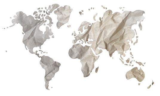 World map paper texture cut out on white background.