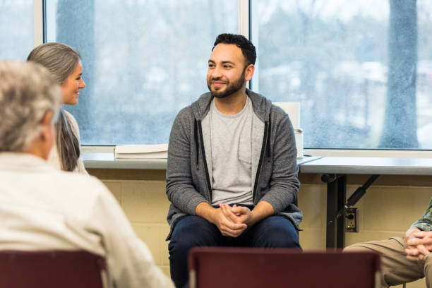 istock Young man nervous about first support group meeting 1486074177