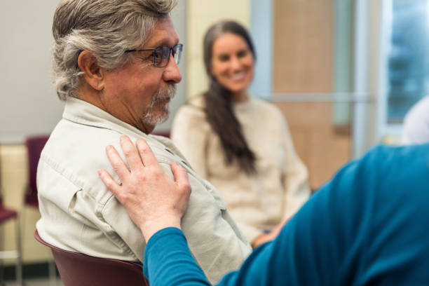 istock When she encourages him, senior man looks at therapist 1486074212