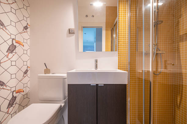 istock Small bathroom with shower in a vacation rental apartment 1486076336