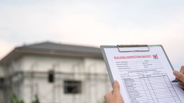 istock Inspecting building house on the report form. 1486077339