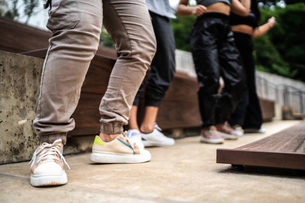 istock Low section of friends dancing outdoors 1486078263