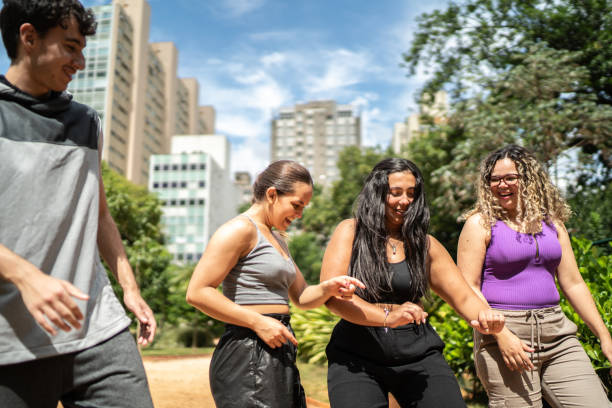 istock Friends dancing outdoors 1486078541