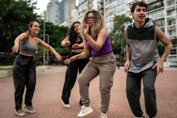 istock Friends dancing outdoors 1486078675