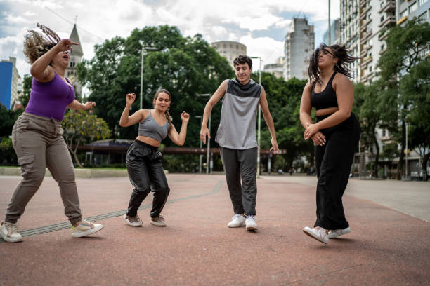 istock Friends dancing outdoors 1486078697