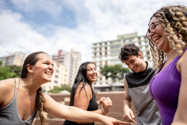 istock Friends dancing outdoors 1486081344