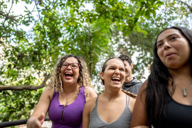 istock Friends walking and taking in the park 1486081430