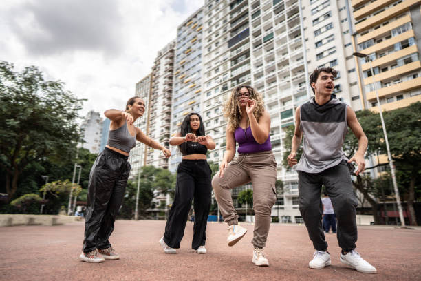 istock Friends dancing outdoors 1486081563