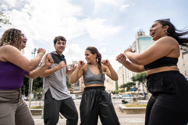 istock Friends dancing outdoors 1486081841
