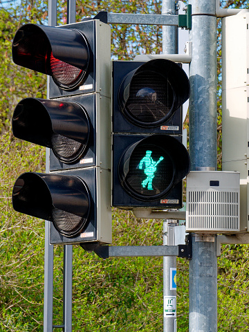 Bad Nauheim, Germany - Traffic light for pedestrians with Elvis Presley silhouette in pose with guitar. Presley was living in Bad Nauheim where he was a soldier in the nearby Friedberg from 1958 to 1960.
