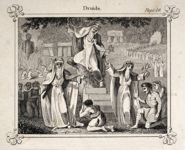 Vintage illustration, Ancient Druids of Britain, Stone circle, henge, burning Wicker man Human sacrifice. Druids were members of the learned class among the ancient Celts. They acted as priests, teachers, and judges.  Image created 1825