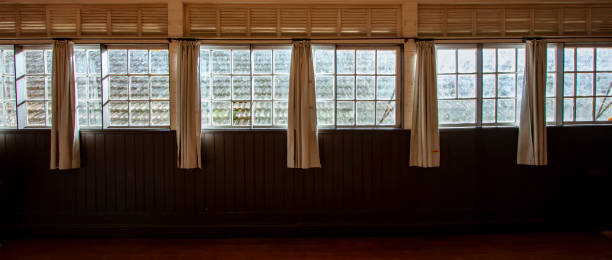 istock Windows and curtains from an old house 1486093576