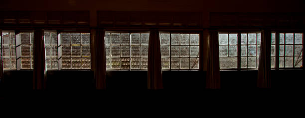 istock Windows and curtains from an old house 1486093684