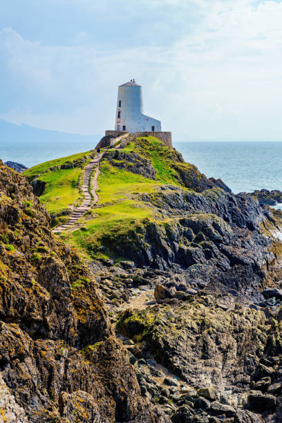 istock Exploring the Famous Lighthouse of Anglesey on Llanddwyn island. 1486101251