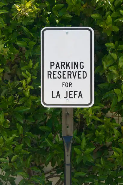 Photo of Reserved for La Jefa only sign in the parking lot