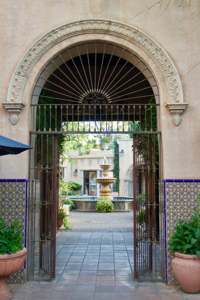 Looking through the archway to the water fountain in the courtyard