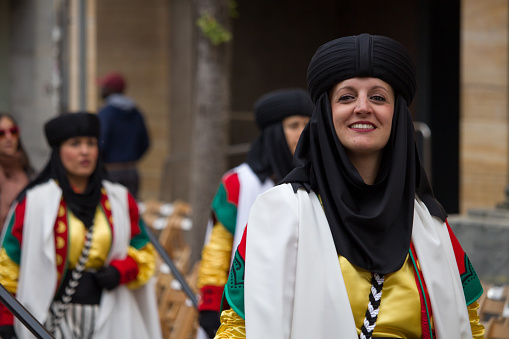04-22-2023 Alcoy, Spain, Traditional Moors and Christians festivities in Alcoy. Benimerines female squad in the act of the reveille