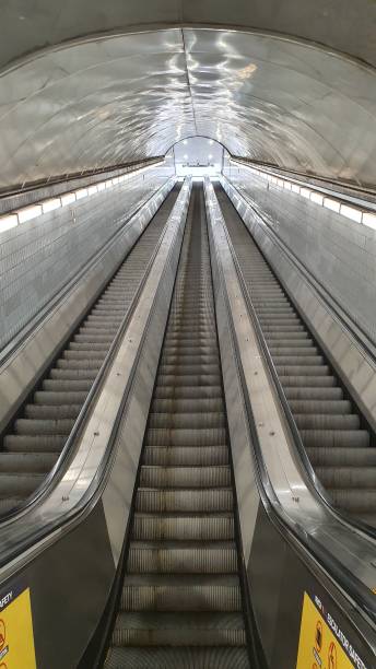 istock Electric escalator in metro, moving staircase 1486111135