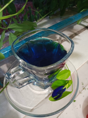 Butterfly pea flower tea, commonly known as blue tea, is a caffeine-free herbal tea, or tisane, beverage made from a decoction or infusion of the flower petals or even whole flower of the Clitoria ternatea plant. Clitoria ternatea is also known as butterfly pea, blue pea, Aprajita, Cordofan pea, Blue Tea Flowers or Asian pigeonwings.