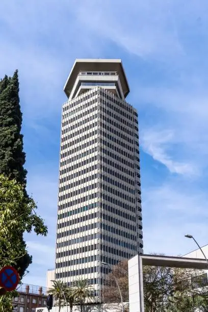 Photo of Barcelona, Spain-April 24, 2023. Edificio Colón Barcelona, Spain, 110 meters high and 28 floors. It stands on Avenida de les Drassanes. It was built in 1970.