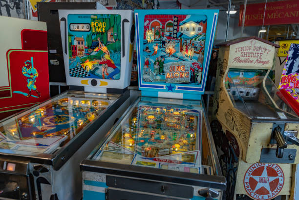 A vintage pinball table displayed at a living history museum exhibit.