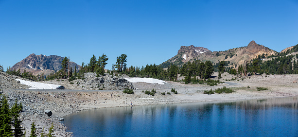 Lassen NP, CA - July 14, 2022:  View of Lake Helen and surrounding peaks and formations